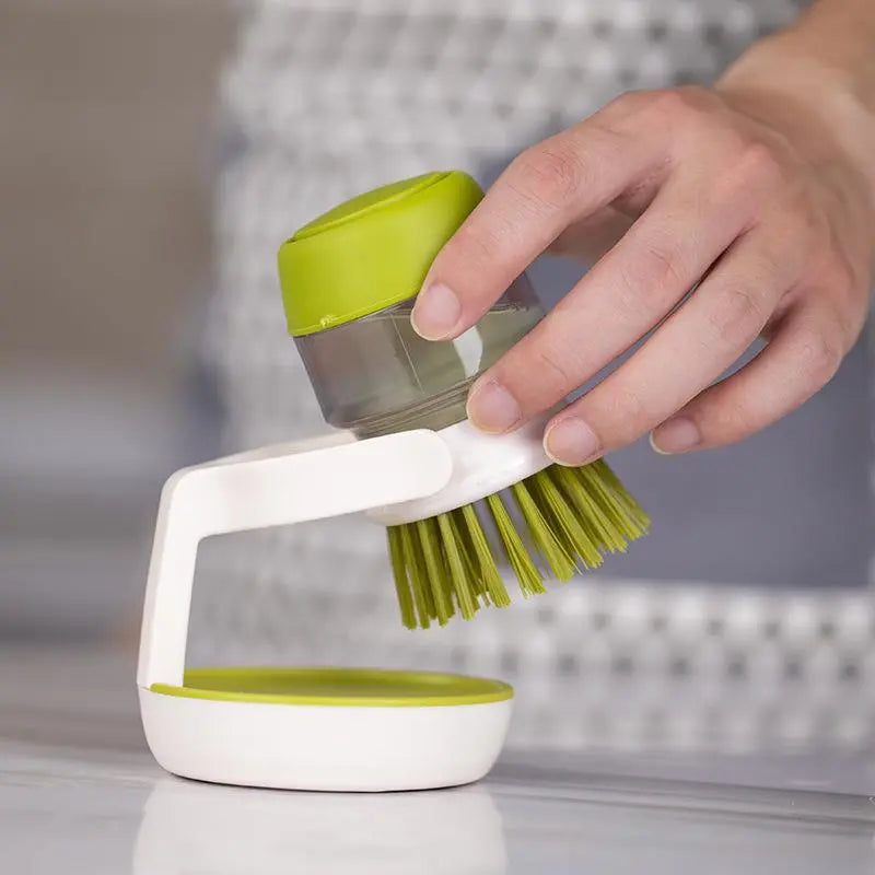 Brosse à vaisselle avec distributeur de liquide